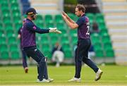 27 August 2023; CIYMS bowler Theo van Woerkom, right, is congratulated by wicketkeeper Chris Dougherty after dismissing Balbriggan batter Farooq Nasr during the Arachas Men's All-Ireland T20 Cup Final match between Balbriggan and CIYMS at Malahide Cricket Ground in Dublin. Photo by Seb Daly/Sportsfile