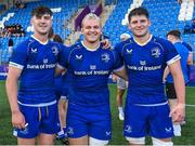 27 August 2023; Leinster players, from left, Andrew Cosgrave, Tom Stewart and Sam Corrigan celebrate after the U19 Men's Interprovincial Championship match between Leinster and Connacht at Energia Park in Dublin. Photo by Piaras Ó Mídheach/Sportsfile