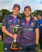 27 August 2023; CIYMS players with the trophy after the Arachas Men's All-Ireland T20 Cup Final match between Balbriggan and CIYMS at Malahide Cricket Ground in Dublin. Photo by Seb Daly/Sportsfile