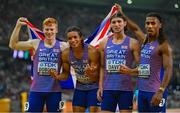 27 August 2023; The Great Britain team, from left, Charles Dobson, Rio Mitcham, Lewis Davey and Alex Haycock-Wilson after winning bronze in the Men's 4x400 Metres Relay final during day nine of the World Athletics Championships at the National Athletics Centre in Budapest, Hungary. Photo by Sam Barnes/Sportsfile