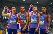 27 August 2023; The Great Britain team, from left, Charles Dobson, Rio Mitcham, Lewis Davey and Alex Haycock-Wilson after winning bronze in the Men's 4x400 Metres Relay final during day nine of the World Athletics Championships at the National Athletics Centre in Budapest, Hungary. Photo by Sam Barnes/Sportsfile
