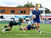 27 August 2023; Ciaran Mangan of Leinster gets past Orin Burke of Connacht, left, on his way to scoring a try during the U19 Men's Interprovincial Championship match between Leinster and Connacht at Energia Park in Dublin. Photo by Piaras Ó Mídheach/Sportsfile