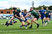 27 August 2023; Ciaran Mangan of Leinster scores a try under pressure from Stefan Roche, left, and Harry Duffy of Connacht during the U19 Men's Interprovincial Championship match between Leinster and Connacht at Energia Park in Dublin. Photo by Piaras Ó Mídheach/Sportsfile