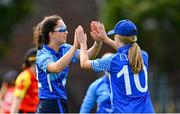 29 August 2023; Ava Canning of Typhoons, left, celebrates with her team-mate Sinead Thompson, after catching out Christina Coulter Reilly of Scorchers, not pictured, during the Evoke Super 50 Cup match between Scorchers and Typhoons at Railway Union Cricket Club in Dublin. Photo by Tyler Miller/Sportsfile