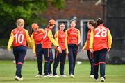 29 August 2023; Aimee Maguire of Scorchers, centre, celebrates with team-mates after bowling out Alice Walsh of Typhoons during the Evoke Super 50 Cup match between Scorchers and Typhoons at Railway Union Cricket Club in Dublin. Photo by Tyler Miller/Sportsfile