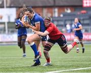 26 August 2023; Niamh Murphy of Leinster is tackled by Aoibheann McGrath of Munster during the Girls Interprovincial Championship match between Leinster and Munster at Energia Park in Dublin. Photo by Piaras Ó Mídheach/Sportsfile