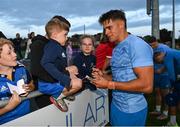 29 August 2023; Aitzol King with Harry Mayberry, age 5, after a Leinster rugby open training session at Clontarf RFC in Dublin. Photo by David Fitzgerald/Sportsfile