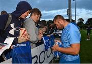 29 August 2023; Jordan Larmour with supporters after a Leinster rugby open training session at Clontarf RFC in Dublin. Photo by David Fitzgerald/Sportsfile