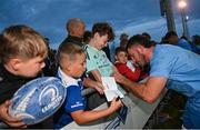 29 August 2023; Will Connors with supporters after a Leinster rugby open training session at Clontarf RFC in Dublin. Photo by David Fitzgerald/Sportsfile