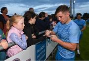 29 August 2023; Luke McGrath with supporters after a Leinster rugby open training session at Clontarf RFC in Dublin. Photo by David Fitzgerald/Sportsfile