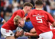 30 August 2023; Max Doyle of Leinster is tackled by Joe Finn of Munster, left, during the U18 Schools Interprovincial Championship match between Leinster and Munster at Energia Park in Dublin. Photo by Harry Murphy/Sportsfile