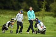 30 August 2023; Marta Sanz Barrio of Spain, left, and Golf Ireland president Jim Long walk down the 15th fairway during the Pro-Am event ahead of the KPMG Women's Irish Open Golf Championship at Dromoland Castle in Clare. Photo by Eóin Noonan/Sportsfile