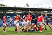 30 August 2023; Chris Barrett of Munster has a kick blocked by Sami Bishti of Leinster during the U18 Schools Interprovincial Championship match between Leinster and Munster at Energia Park in Dublin. Photo by Harry Murphy/Sportsfile
