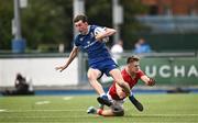 30 August 2023; Brian O'Flaherty of Leinster is tackled by James O’Leary of Munster during the U18 Schools Interprovincial Championship match between Leinster and Munster at Energia Park in Dublin. Photo by Harry Murphy/Sportsfile