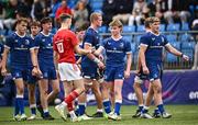 30 August 2023; Fionn Carney of Leinster shakes hands with Tom Wood of Munster after the U18 Schools Interprovincial Championship match between Leinster and Munster at Energia Park in Dublin. Photo by Harry Murphy/Sportsfile