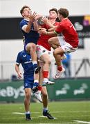 30 August 2023; Charlie Molony of Leinster contests a high ball with Harry Murphy and Chris Barrett of Munster during the U18 Schools Interprovincial Championship match between Leinster and Munster at Energia Park in Dublin. Photo by Harry Murphy/Sportsfile
