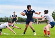 30 August 2023; Daniel Gill of North Midlands in action against Daniel Corr, left, and Conor Casey of Midlands during the BearingPoint Shane Horgan Cup match between North Midlands and Midlands at Cill Dara RFC in Kildare. Photo by Tyler Miller/Sportsfile