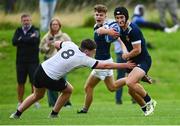 30 August 2023; Daniel Gill of North Midlands evades the tackle of Daniel Corr of Midlands during the BearingPoint Shane Horgan Cup match between North Midlands and Midlands at Cill Dara RFC in Kildare. Photo by Tyler Miller/Sportsfile