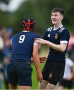 30 August 2023; Joshua O'Keeffe of North Midlands, left, is congratulated by teammate Daniel McConnell after he scores a try during the BearingPoint Shane Horgan Cup match between North Midlands and Midlands at Cill Dara RFC in Kildare. Photo by Tyler Miller/Sportsfile
