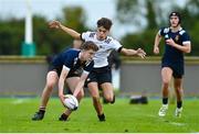 30 August 2023; Hugh Martin of North Midlands in action against Oran Finlay of Midlands during the BearingPoint Shane Horgan Cup match between North Midlands and Midlands at Cill Dara RFC in Kildare. Photo by Tyler Miller/Sportsfile