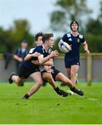 30 August 2023; Hugh Martin of North Midlands is tackled by Oran Finlay of Midlands during the BearingPoint Shane Horgan Cup match between North Midlands and Midlands at Cill Dara RFC in Kildare. Photo by Tyler Miller/Sportsfile