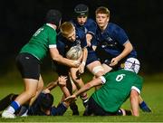 30 August 2023; Donnacha Cunningham of Metro is tackled by Euan McQuillan, left, and Cillian McElwee of South East during the BearingPoint Shane Horgan Cup match between South East and Metro at Cill Dara RFC in Kildare. Photo by Tyler Miller/Sportsfile
