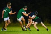 30 August 2023; Christian Sinclair of Metro is tackled by James Slattery of South East during the BearingPoint Shane Horgan Cup match between South East and Metro at Cill Dara RFC in Kildare. Photo by Tyler Miller/Sportsfile