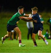 30 August 2023; Oisín O'Buachalla of Metro in action against Ewan Meyer of South East during the BearingPoint Shane Horgan Cup match between South East and Metro at Cill Dara RFC in Kildare. Photo by Tyler Miller/Sportsfile