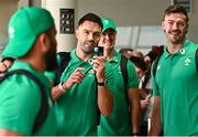 31 August 2023; Conor Murray films at Dublin Airport ahead of Ireland's Aer Lingus flight to France for the 2023 Rugby World Cup. Photo by Harry Murphy/Sportsfile