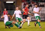17 August 2023; Michael Duffy of Derry City in action against Albert Gabaraev of Tobol during the UEFA Europa Conference League Third Qualifying Round second leg match between Derry City and FC Tobol at Tallaght Stadium in Dublin. Photo by Stephen McCarthy/Sportsfile