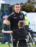 1 September 2023; Keith Buckley of Bohemians is greeted by the matchday mascots before the SSE Airtricity Men's Premier Division match between Shamrock Rovers and Bohemians at Tallaght Stadium in Dublin. Photo by Tyler Miller/Sportsfile