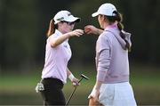 1 September 2023; Leona Maguire of Ireland, left, with playing partner Áine Donegan of Ireland on the 18th green after their round during day two of the KPMG Women's Irish Open Golf Championship at Dromoland Castle in Clare. Photo by Eóin Noonan/Sportsfile