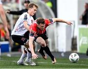 1 September 2023; Cameron McJannet of Derry City in action against Johannes Yli-Kokko of Dundalk during the SSE Airtricity Men's Premier Division match between Dundalk and Derry City at Oriel Park in Dundalk, Louth. Photo by Ramsey Cardy/Sportsfile