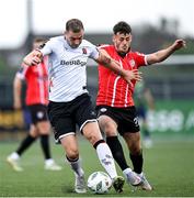 1 September 2023; Darren Brownlie of Dundalk in action against Danny Mullen of Derry City during the SSE Airtricity Men's Premier Division match between Dundalk and Derry City at Oriel Park in Dundalk, Louth. Photo by Ramsey Cardy/Sportsfile