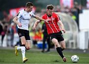 1 September 2023; Cameron McJannet of Derry City in action against Daniel Kelly of Dundalk during the SSE Airtricity Men's Premier Division match between Dundalk and Derry City at Oriel Park in Dundalk, Louth. Photo by Ramsey Cardy/Sportsfile