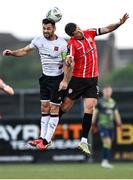 1 September 2023; Patrick McEleney of Derry City and Patrick Hoban of Dundalk compete for a header during the SSE Airtricity Men's Premier Division match between Dundalk and Derry City at Oriel Park in Dundalk, Louth. Photo by Ramsey Cardy/Sportsfile