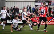 1 September 2023; Danny Mullen of Derry City shoots at goal under pressure from Darren Brownlie of Dundalk during the SSE Airtricity Men's Premier Division match between Dundalk and Derry City at Oriel Park in Dundalk, Louth. Photo by Ramsey Cardy/Sportsfile