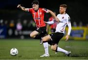 1 September 2023; Adam O'Reilly of Derry City is tackled by Connor Malley of Dundalk during the SSE Airtricity Men's Premier Division match between Dundalk and Derry City at Oriel Park in Dundalk, Louth. Photo by Ramsey Cardy/Sportsfile