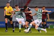 1 September 2023; James Clarke of Bohemians is tackled by Markus Poom of Shamrock Rovers, left, and Gary O'Neill during the SSE Airtricity Men's Premier Division match between Shamrock Rovers and Bohemians at Tallaght Stadium in Dublin. Photo by Tyler Miller/Sportsfile