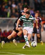 1 September 2023; Gary O'Neill of Shamrock Rovers is tackled by James Clarke of Bohemians during the SSE Airtricity Men's Premier Division match between Shamrock Rovers and Bohemians at Tallaght Stadium in Dublin. Photo by Tyler Miller/Sportsfile