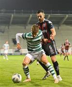 1 September 2023; Johnny Kenny of Shamrock Rovers in action against Jordan Flores of Bohemians during the SSE Airtricity Men's Premier Division match between Shamrock Rovers and Bohemians at Tallaght Stadium in Dublin. Photo by Tyler Miller/Sportsfile