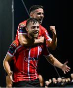 1 September 2023; Will Patching of Derry City celebrates with teammate Jordan McEneff, above, after scoring their side's third goal, a penalty, during the SSE Airtricity Men's Premier Division match between Dundalk and Derry City at Oriel Park in Dundalk, Louth. Photo by Ramsey Cardy/Sportsfile