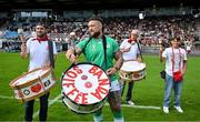 2 September 2023; Andrew Porter bangs a drum as a local band entertain the crowd during an Ireland rugby open training session at Stade Vallée du Cher in Tours, France. Photo by Brendan Moran/Sportsfile