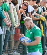 2 September 2023; Jeremy Loughman signs autographs for local supporters after an Ireland rugby open training session at Stade Vallée du Cher in Tours, France. Photo by Brendan Moran/Sportsfile