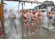 2 September 2023; Competitors shower after the 103rd Jones Engineering Liffey Swim organised by Leinster Open Sea. Photo by David Fitzgerald/Sportsfile