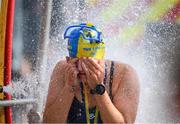 2 September 2023; Gemma Farrelly, Glenalbyn Masters, takes a shower after competing in the 103rd Jones Engineering Liffey Swim organised by Leinster Open Sea. Photo by Ray McManus/Sportsfile