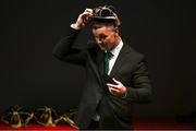 2 September 2023; Ireland captain Jonathan Sexton puts on his cap during the Ireland Rugby World Cup 2023 welcome ceremony at Le Grand Théâtre de Tours in France. Photo by Brendan Moran/Sportsfile