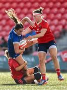 2 September 2023; Leah Tarpey of Leinster is tackled by Stephanie Nunan, left, and Chloe Pearse of Munster during the Vodafone Women’s Interprovincial Championship final between Munster and Leinster at Musgrave Park in Cork. Photo by Eóin Noonan/Sportsfile