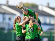 2 September 2023; Ellen Dolan of Peamount United, hidden, celebrates with teammates after scoring their side's second goal during the SSE Airtricity Women's Premier Division match between DLR Waves and Peamount United at Whitehall Stadium in Dublin. Photo by Tyler Miller/Sportsfile