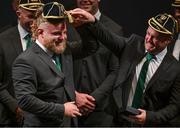 2 September 2023; Finlay Bealham, left, gets help from teammate Dave Kilcoyne on putting on his Rugby World Cup 2023 cap during the Ireland Rugby World Cup 2023 welcome ceremony at Le Grand Théâtre de Tours in France. Photo by Brendan Moran/Sportsfile